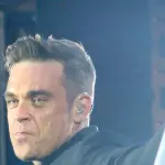 Robbie Williams cambia etichetta ed annuncia uscita nuovo album
